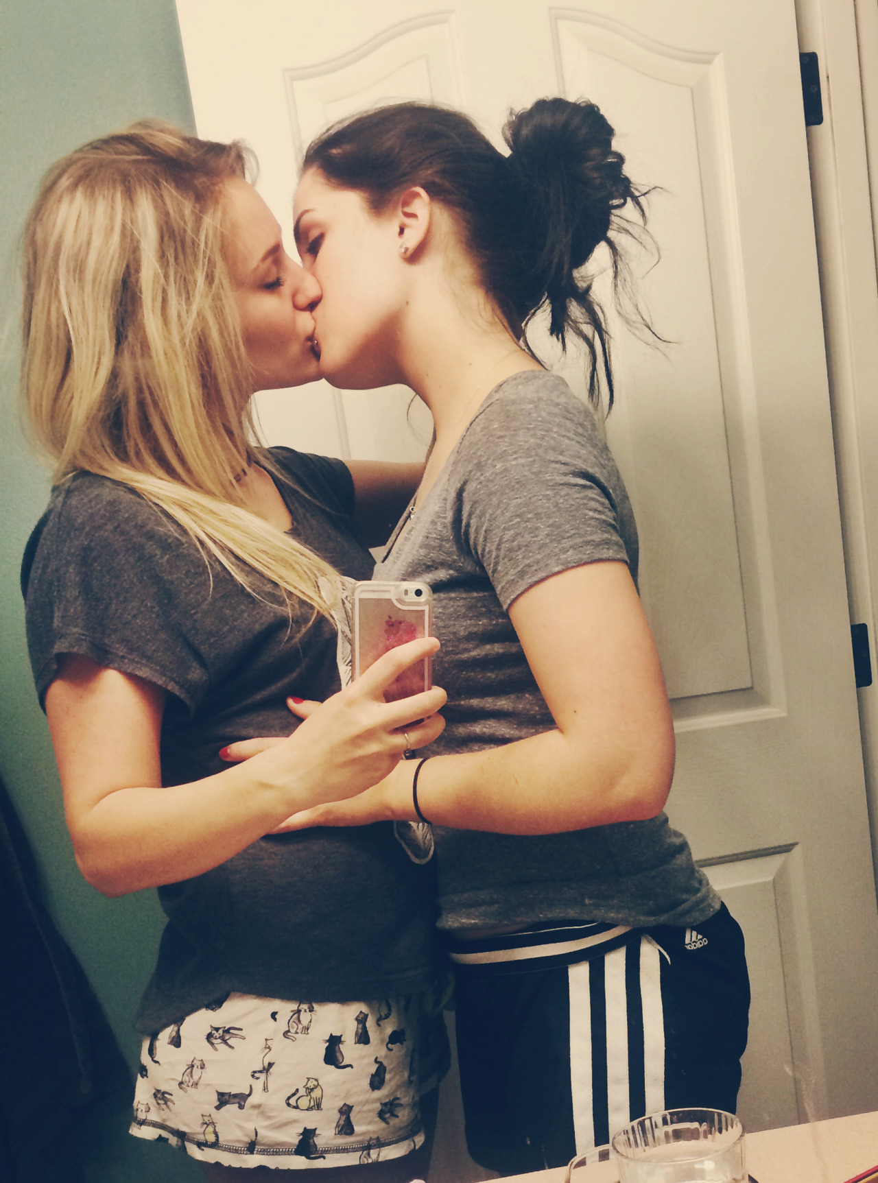 Two Teenage Girls Kissing
