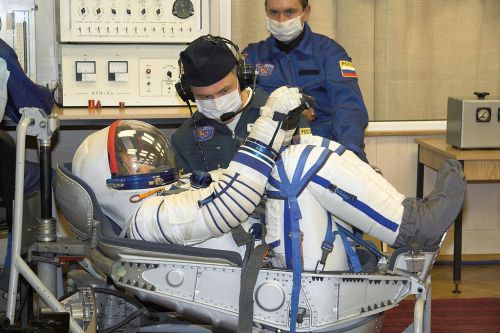 Peggy Whitson undergoes a suit leak check a few days before her launch to the ISS, where she would s