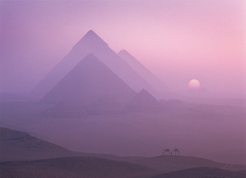 grandegyptianmuseum:    Sunrise over the Pyramids, Giza  Photo: Brian Lawrence 