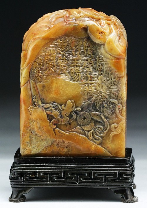 A Fine Chinese Antique Shoushan Soapstone Seal: presented on a wood standDimensions: H: 3-&frac1