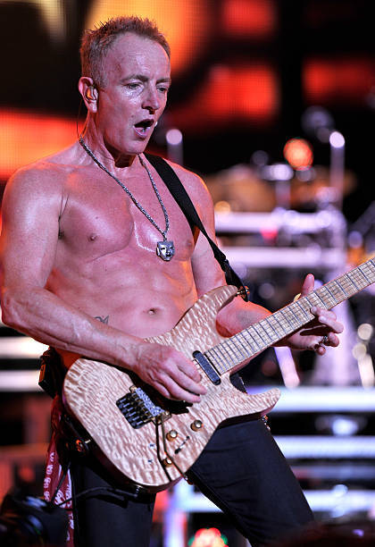 bravenew-what:Phil Collen - During Def Leppard’s performance at the Jones Beach Theater on July 30, 