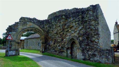 Byland Abbey Gatehouse, incorporated into Farm Buildings, North Yorkshire, England.