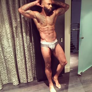 dominicanblackboy:  Sexy tatted hotboy Ivanie Murphy cute muscle tatted ass!😍  Sexy brother  mmm