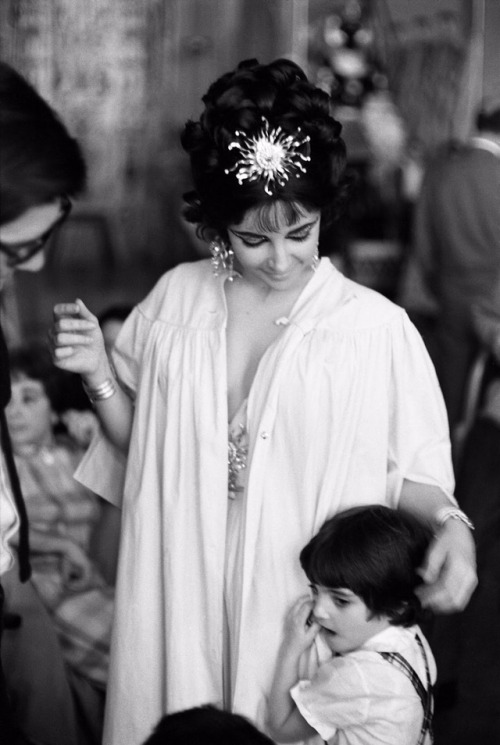 vintageeveryday: Elizabeth Taylor ruffling Liza Todd’s hair during a break in the filming of &