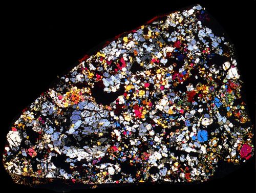 fuckyeahmineralogy:
“Thin section of an Antarctic meteorite
”