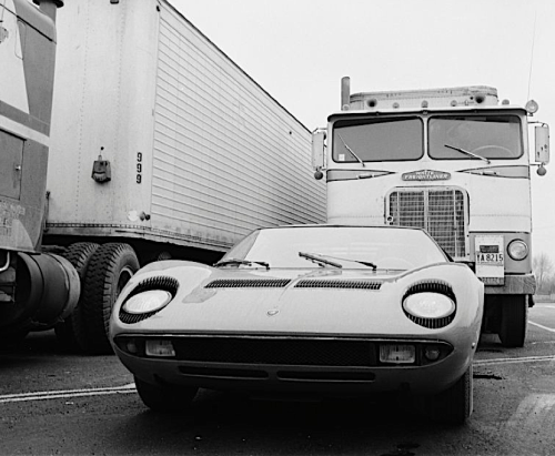Great period image of a Lamborghini Miura shot at a USA truck stop in 1967.
