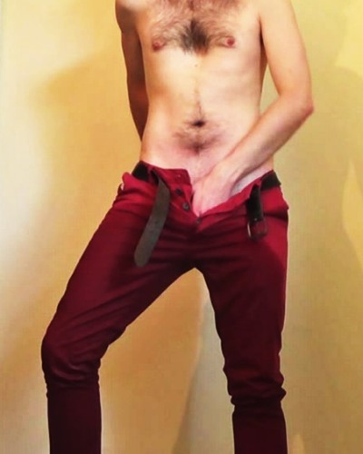 cutewetmess:  Photos of me pissing in bright red pants! ;0) Male desperation, wetting