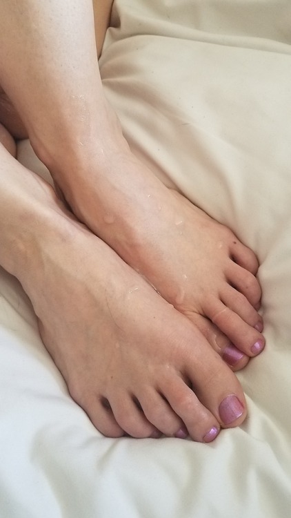 My pretty wifes beautiful feet getting some of that all natural lotion that she loves so much .