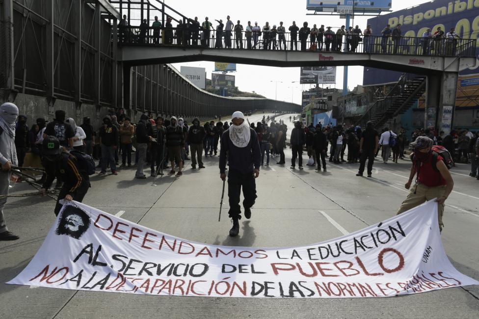 massconflict:  Tens of thousands of people dressed in black have marched through