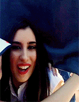 5harmonism:  Lauren climbing on a wall to greet fans and take pictures with them
