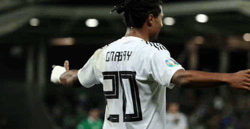 mariogoetze:Serge Gnabry of Germany going for little ride while celebrating with Kai Havertz who giv