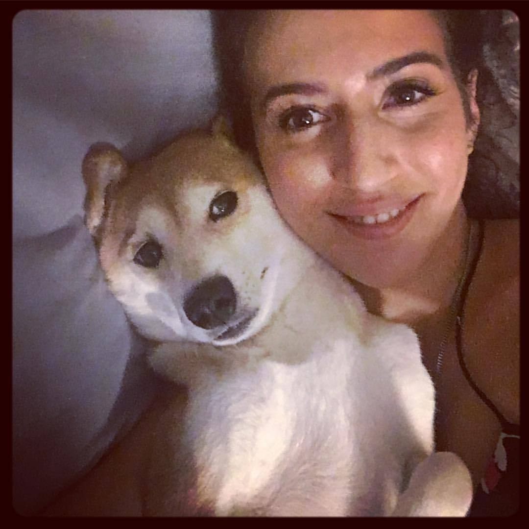 She gets so excited when I get home from a trip but haaates taking photos with me.