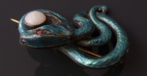 cair–paravel:Meyle & Mayer snake brooch, c. 1900. Silver, enamel, and opal snake brooch.