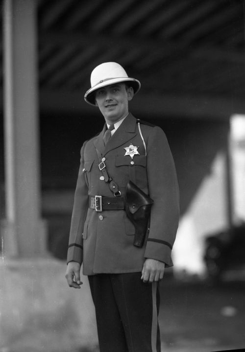 Chicago Police Officers model their new uniforms, designed to be worn during the Century of Progress