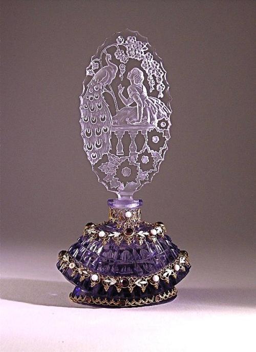 1920s perfume bottle in purple crystal, jeweled metalwork, with clear intaglio stopper, dauber stub.