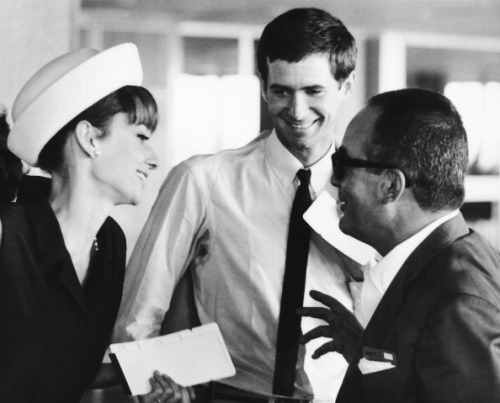 rareaudreyhepburn:  Audrey Hepburn, Anthony Perkins, and Italian film producer Dino de Laurentis photographed by Pierluigi Praturlon at the Orly Airport in Paris, France, July 28, 1962.