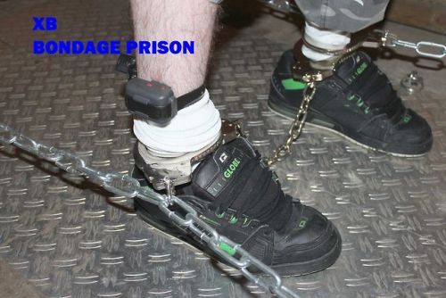 torturesadist:Love those ultra high secure handcuffs and steel door. The solid steel door goes over 