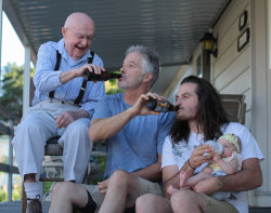 sixpenceee:  Dads feeding their children.Source