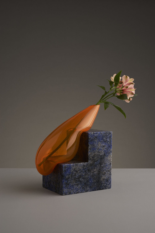 itscolossal:Misshapen Glass Vases by Studio E.O Appear to Melt Atop Angular Stone Platforms