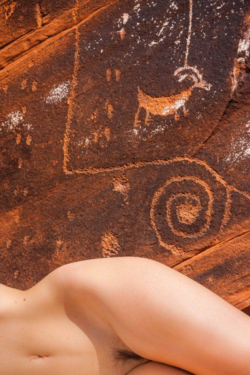 mylifeasamuse:Pretty unique background to pose against: 3000 years old petroglyphs at Lake Powell, UT. Photography by Craig Blacklock   Indigenous. 