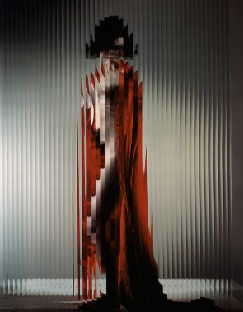 disease:ERWIN BLUMENFELD / LISETTE BEHIND FLUTED GLASS / 1943