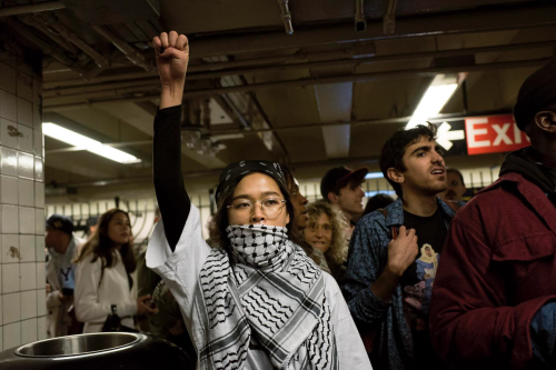 fuckyeahmarxismleninism:    NYers Jump Turnstiles En Masse To Protest Police Brutality On The Subway   Close to 1,000 people marched through Downtown Brooklyn on Friday night to protest police brutality and a recent crackdown on fare evasion inside the