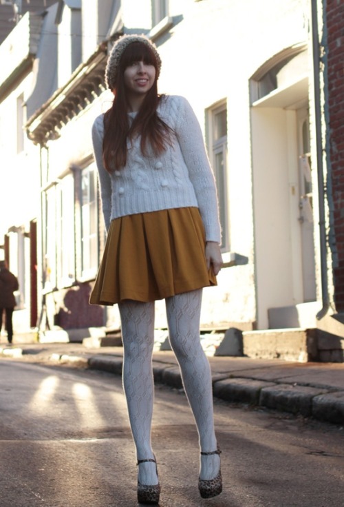 Brunette in white tights and leopard heels. (from him)