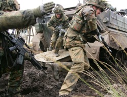 militaryarmament:  German Panzer Grenadiers of the 92nd Panzer Grenadier Training Battalion storming out of a Marder 1A3 Infantry Fighting Vehicle during a training exercise at the Army Training Centre in Münster, Germany. 1st Sep, 2010.