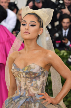 yourstrulys:  Ariana Grande attends the Heavenly Bodies: Fashion &amp; The Catholic Imagination Costume Institute Gala at The Metropolitan Museum of Art on May 7, 2018 in New York City.