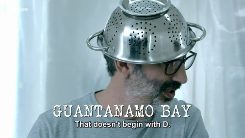 [ID: Two screencaps from Taskmaster. Jo Brand says, “Guantanamo Bay.” Turning to her with a metal co