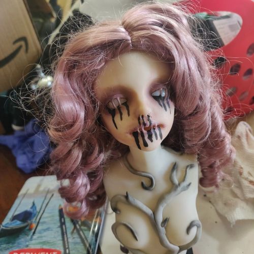 My ghost girl is coming along, she needs some black eyes and for her body to ship out from resinsoul