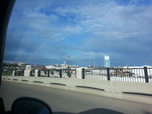 View of crossing the Fox River a few days ago while going home from 56 cent short stacks at IHOP. Look, a rainbow! -Jessy