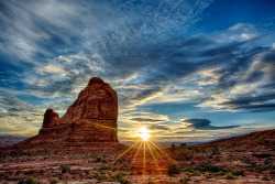 atlasobscura:  Sunrise and some building