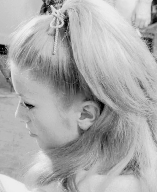 Catherine Deneuve on the set of The Umbrellas of Cherbourg