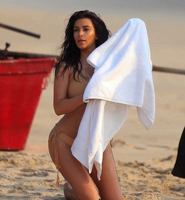 braca-muska:  March 31, 2014 - Kim Kardashian on set of a photoshoot in Thailand