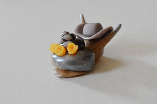 charlietheskonk:a custom set of fallout 4 snails:  here we have snails hancock, the unfortunate vault-tec rep, kent cono