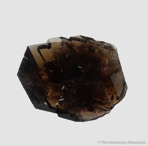 AxiniteThe rare mineral group known as axinite grows in beautiful bladed axe like crystals that are 