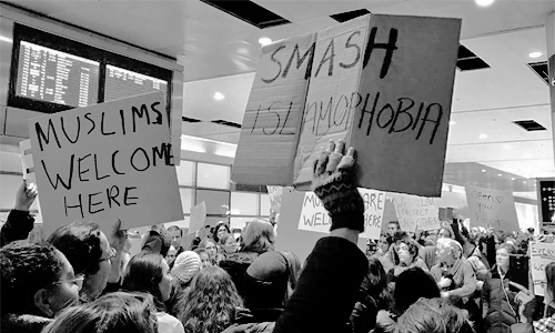 wesleygasm:Thousands got out today in airports to protest against Trump’s Muslim Ban singing “This L