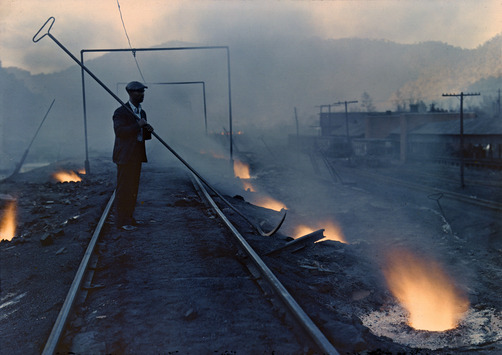 unrar:    Flames glow from old-fashioned furnaces that turn coal into coke, West