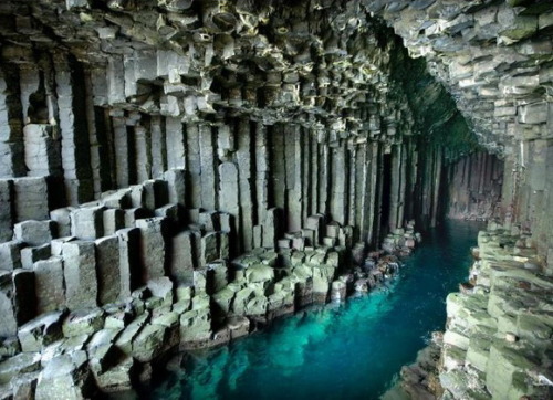 flowing-more-freely-than-wine:Fingal’s Cave, UK “Its size and naturally arched roof, and the eerie sounds produced by the echoes of waves, give it the atmosphere of a natural cathedral. The cave’s Gaelic name, An Uaimh Bhinn, means ‘the melodious