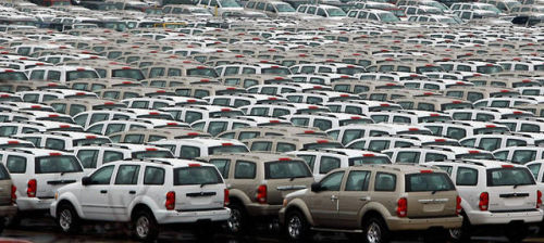 sciencevevo:mansfrombelow:canadian-communist:  Where the World’s Unsold Cars Go to Die Above are pho