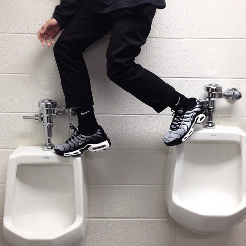 XXX calvaxxin:  Standing on urinals photo