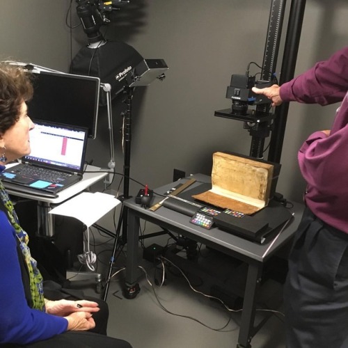 Mike Toth, with assistance from Barbara Brizdle, demonstrates multispectral imaging on an illegible 