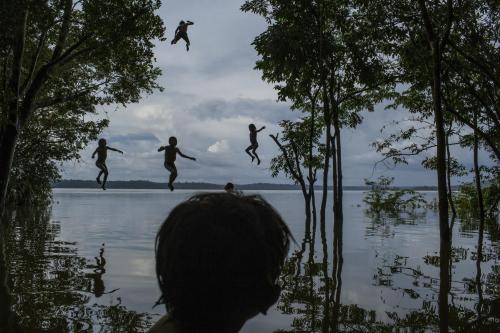 laid-up:Amazon’s Munduruku Tribe by Mauricio LimaChildren play in the Tapajós River, home to the Mun