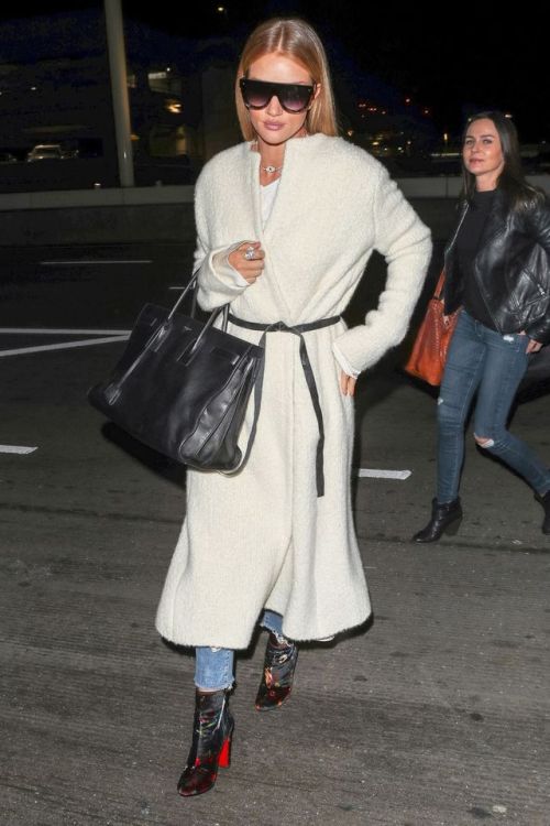 harpersbazaar: Rosie Huntington-Whiteley’s Boot Game Is on PointShop her chic winter look.&nbs