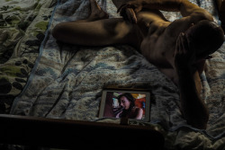 tommyjones651:  Naked man watching porn on his iPad…putting technology to good use. 