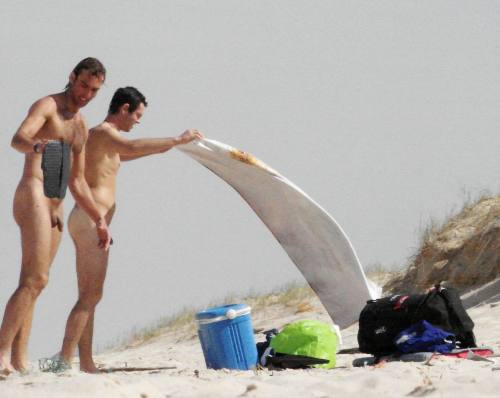 borbor1:Surfers shed their wet suits and relax.