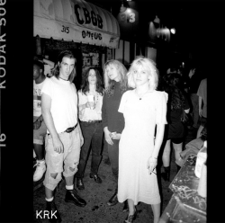 fuckyeahcourtneylove:  Courtney, Jill Emery and Carolyn Rue with Michael ‘Cali’ Dewitt. Outside CBGB in New York. 1991. Thanks to krk. 