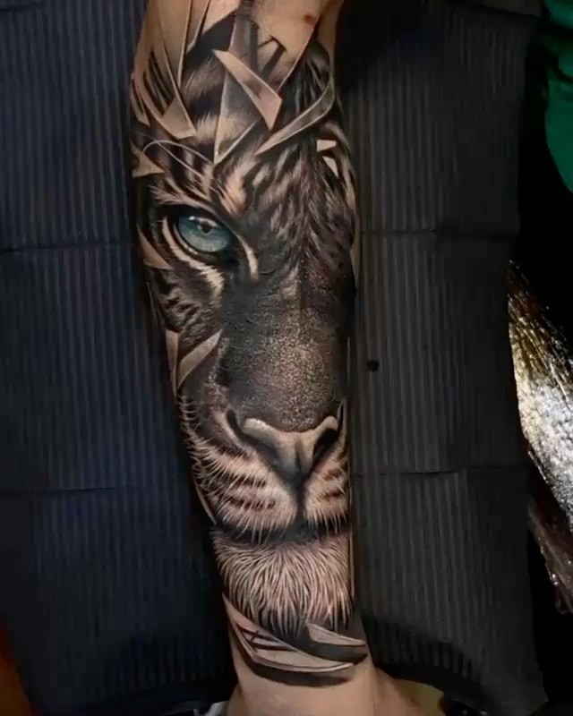 Tattoo uploaded by Drake 🔅 • Tiger forearm tattoo • Tattoodo