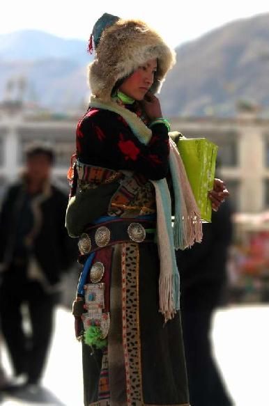 Women of Tibet (click to enlarge)8. Traditional turquoise jewelry, Lhasa, Tibet by Nora de Angelli